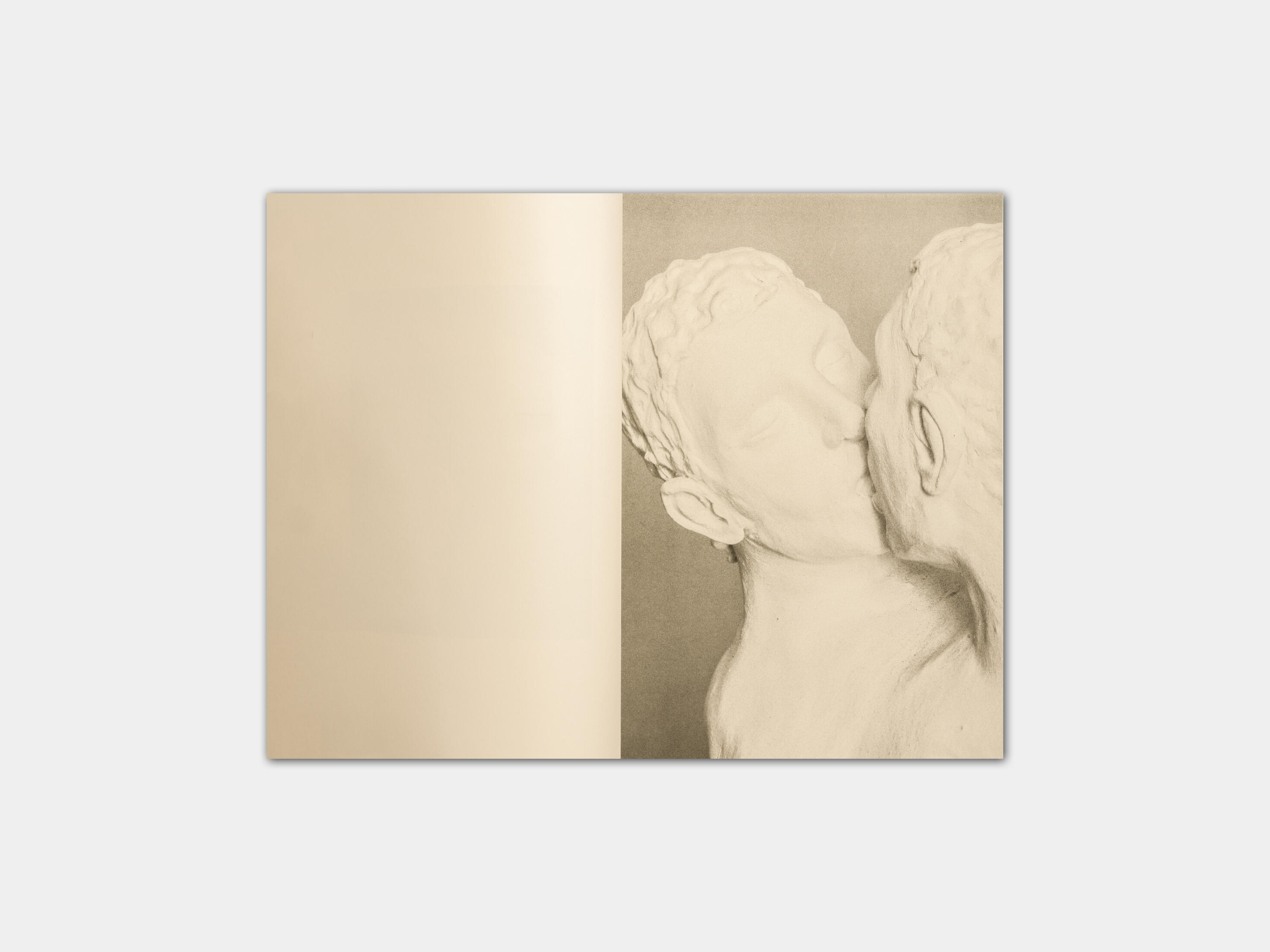 art book with sculpture of a flower emerging from a hand by Gabrielle Carrère