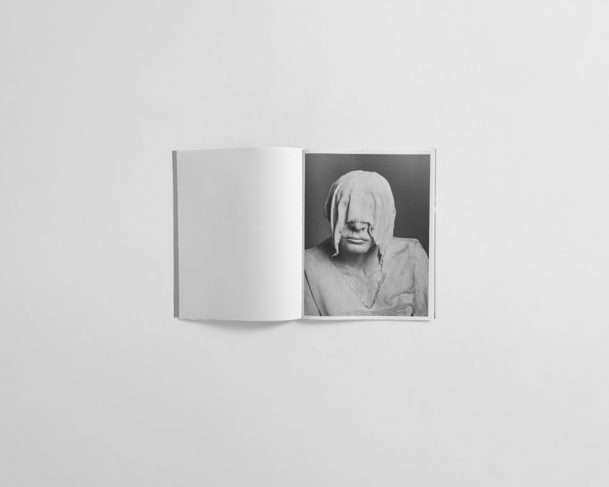 Art book with mysterious face