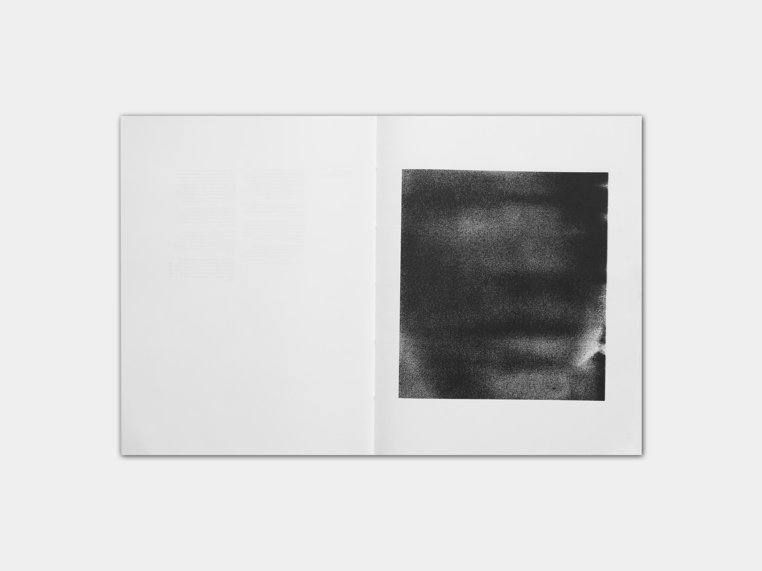 art book with abstract black and white image of a face