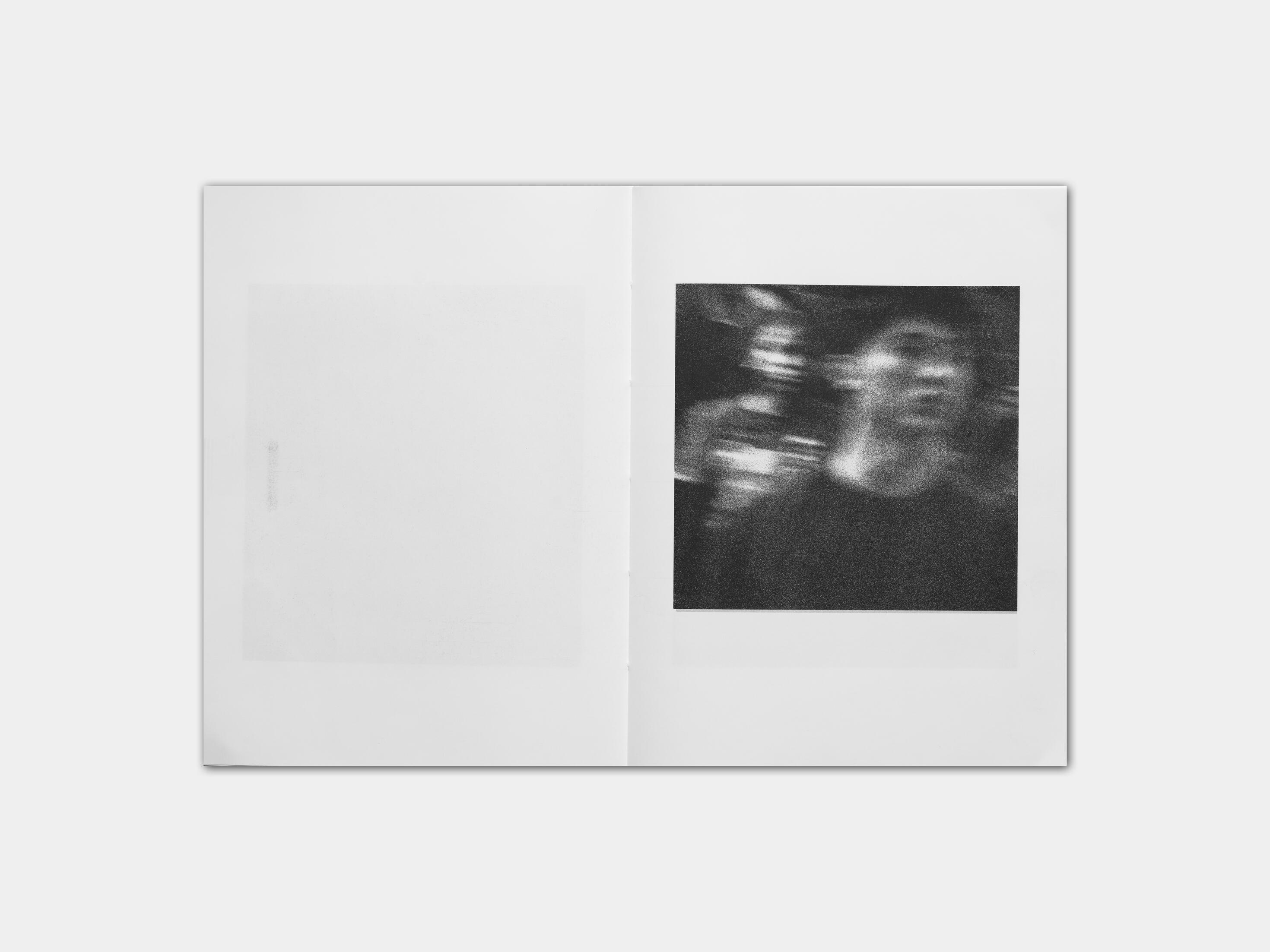 art book with abstract black and white image of a mans face