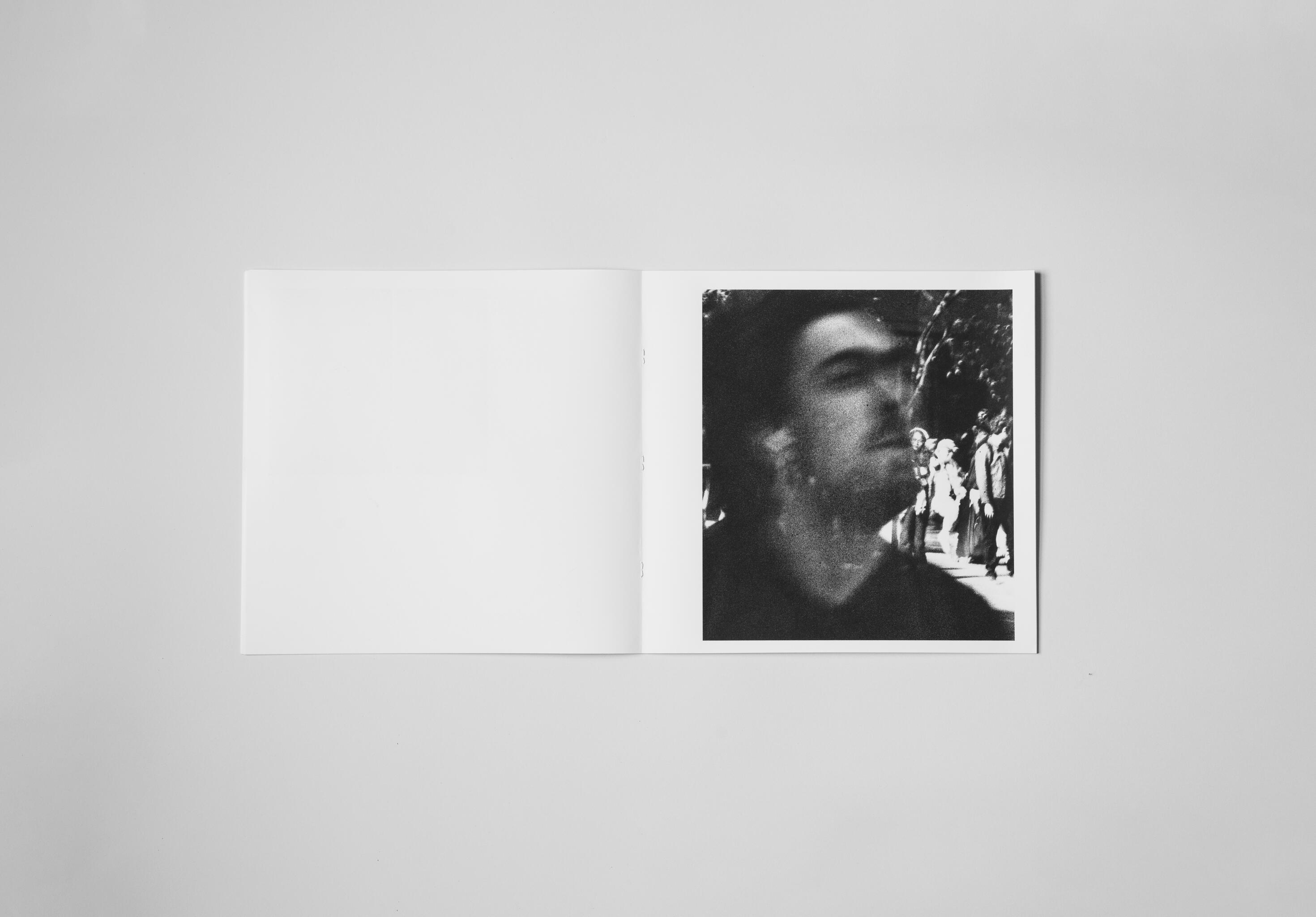art book with abstract black and white image of a mans face