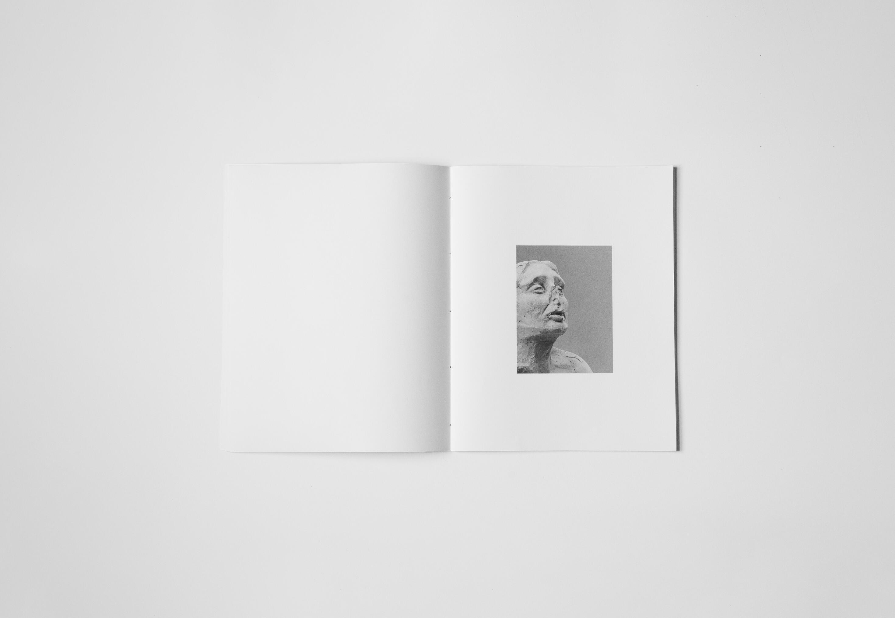 art book with sculpture of a feast by Gabrielle Carrère