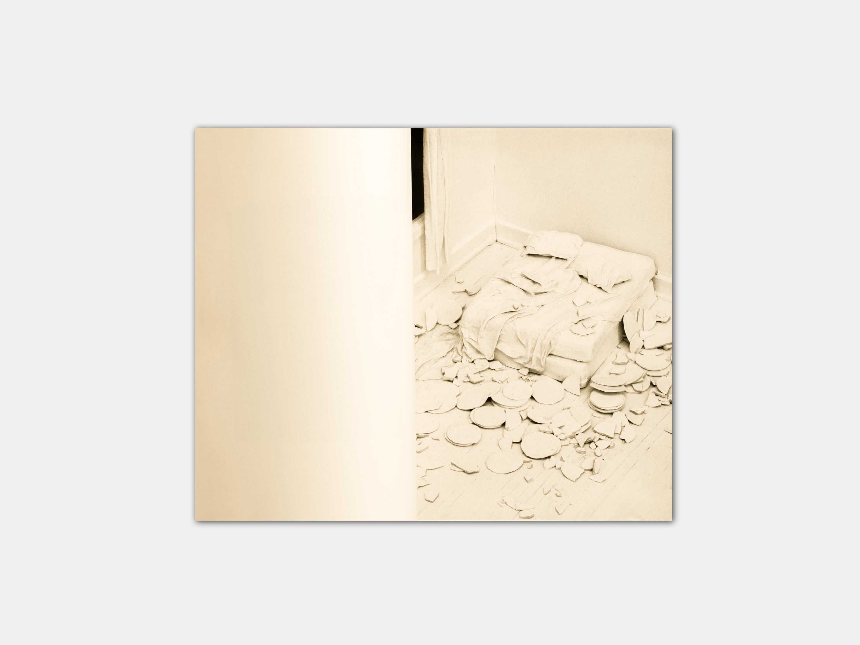 art book with sculpture of two people kissing by Gabrielle Carrère