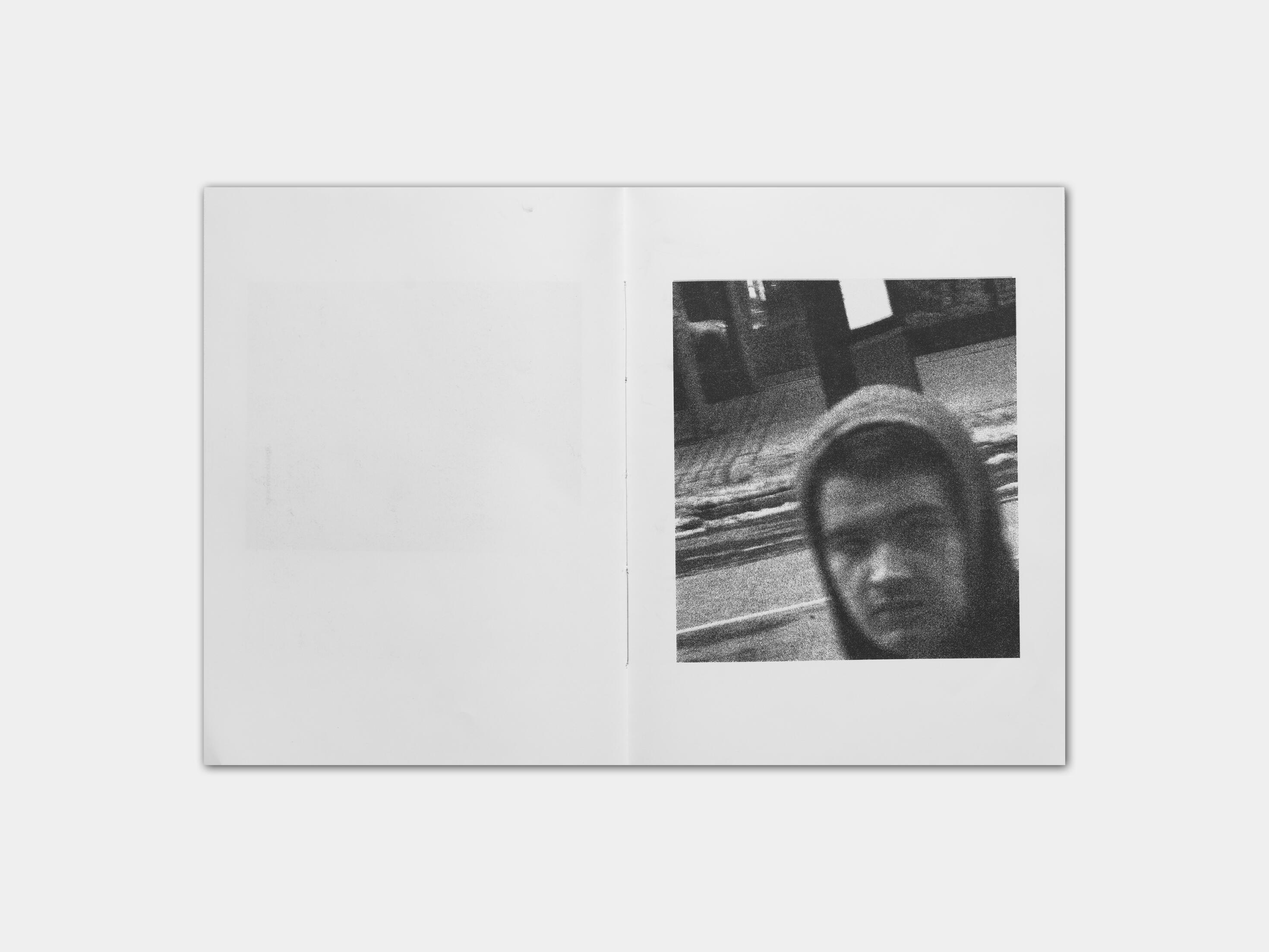 art book with abstract black and white image of a womans face