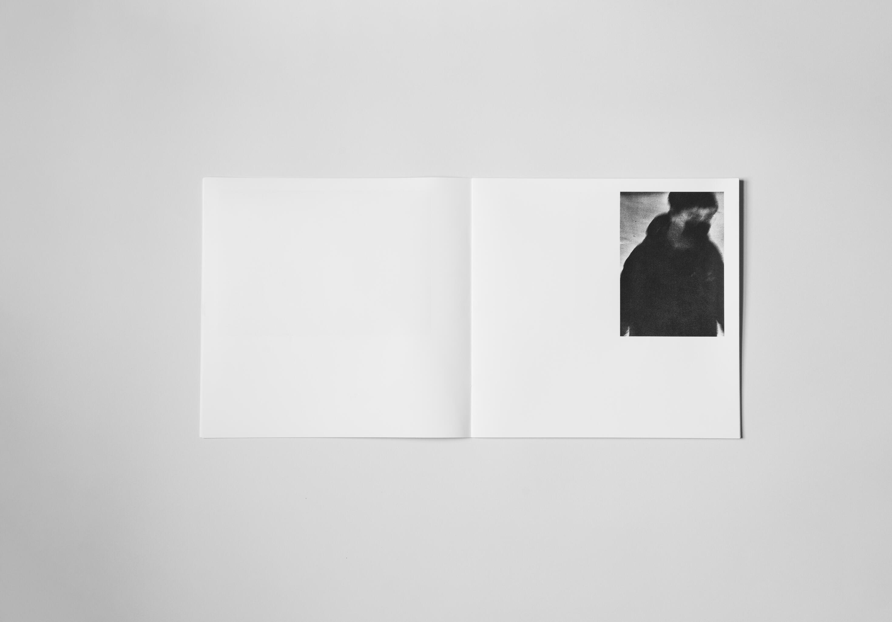art book with abstract black and white image of a womans face