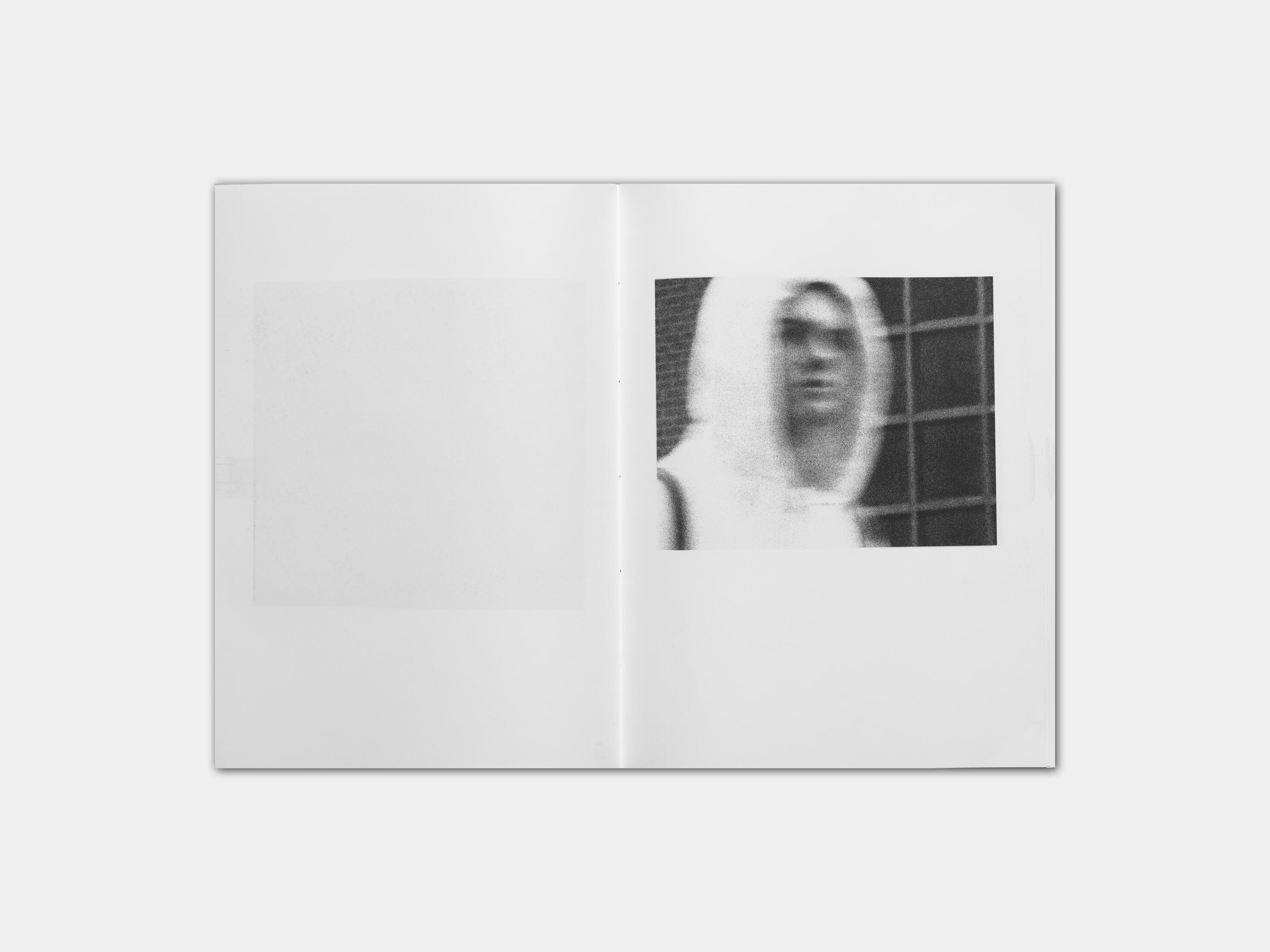 art book with abstract black and white image of a mans face