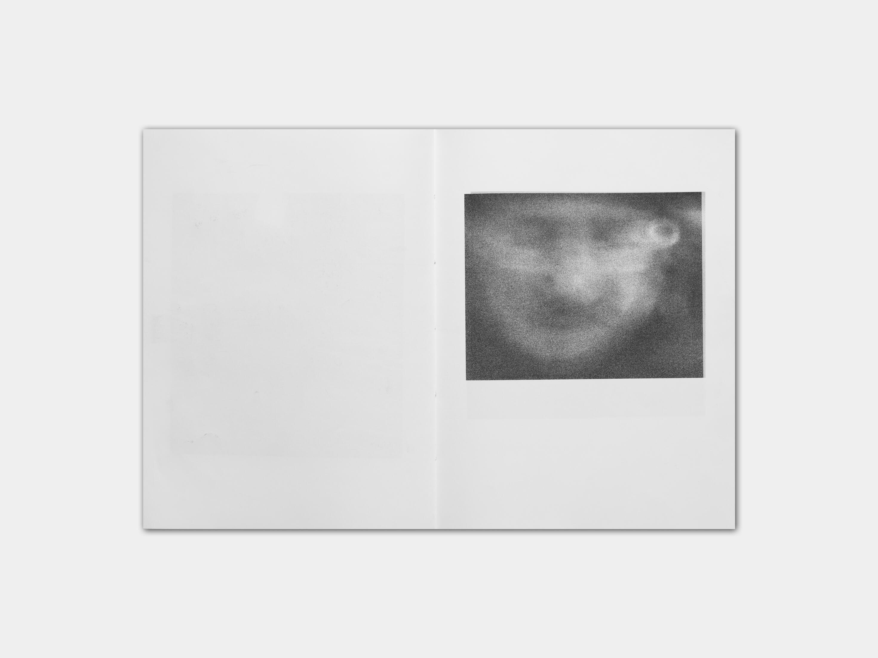 art book with abstract black and white image of a mans face