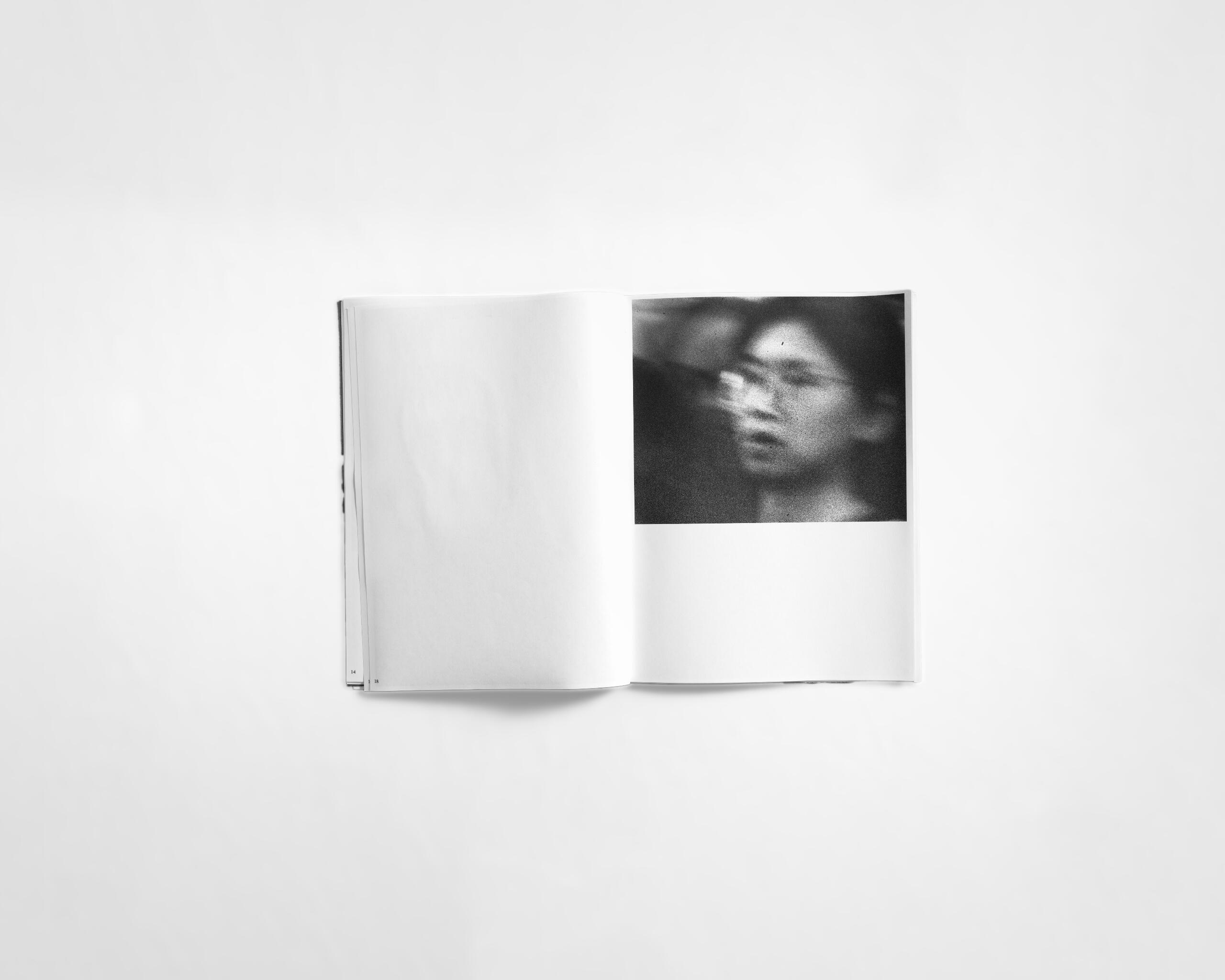 art book with abstract black and white image of a face