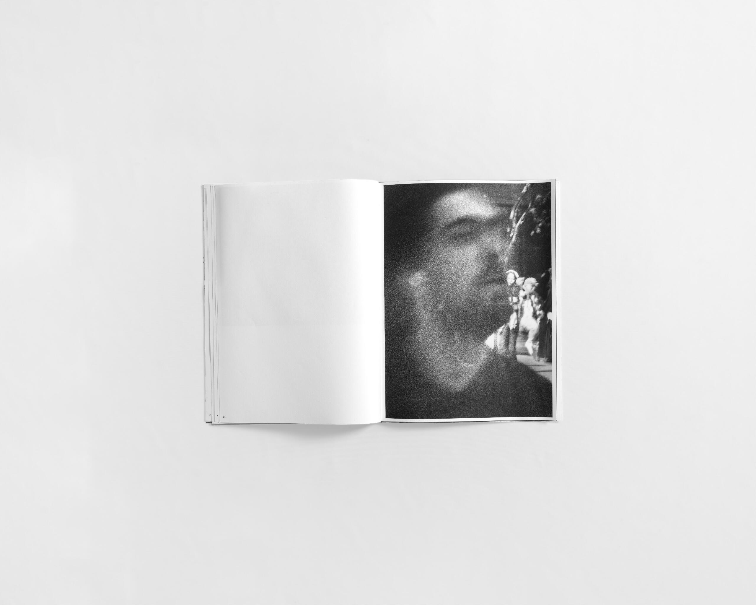art book with abstract black and white image of a mans face